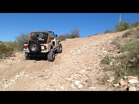 Lifted 1985 Jeep CJ7 Trail Riding