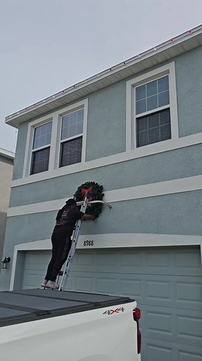 1.4K views | Candy Cane Roofline & Holiday Charm ❤️懶 Today’s install was a fun one! We decorated this beautiful two-story home with a candy cane roofline pattern and added a classic wreath above the garage for the perfect festive touch. From tall ladders to tidy lines — we handle the hard work so you can enjoy the sparkle all season long. ✨ Licensed • Insured • Holiday-obsessed ✅  352-299-8077  SpotlessExteriorSolutions.com | Spotless Exterior Solutions | Facebook