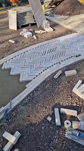 Challenging Curving Herringbone Patio Project