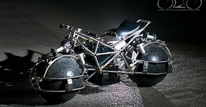 Students designing an omnidirectional sphere-wheeled electric motorcycle