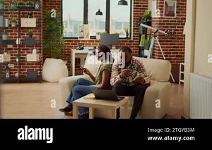 Mad people arguing and fighting at home, being angry about difficulties on couch. Couple sitting back to back and having argument, being angry about relationship problems yelling Stock Video Footage - Alamy
