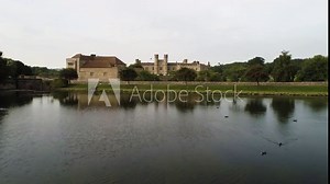 Leeds Castle revealed from river, beautiful symmetrical architecture