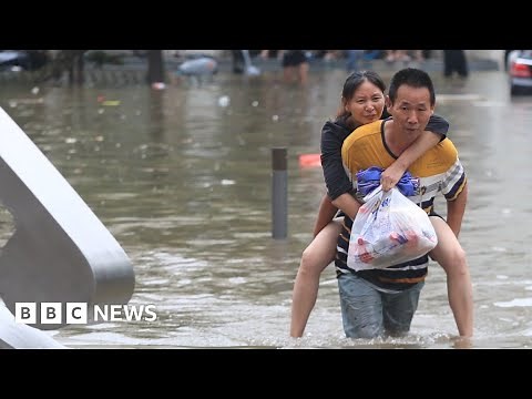 Hundreds of thousands evacuated as floods ravage southern China - BBC News