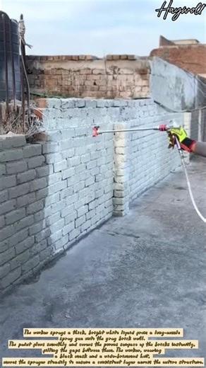 Applying weather shield paint to a brick wall using an airless spray machine
