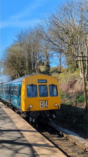 A first generation class 101 DMU departs Oxenhope with a Keighley Service with thrash and some clag