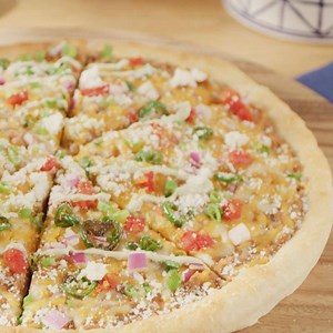 5.5K views · 45 reactions | Mexican-style pizza? Sign us up.  Tip: Top the pizza with jalapeños for a peppery flavor. Grab the recipe here: www.kroger.com/r/spicy-mexican-pizza-recipe/5f75d7de9da07c73268a47b0 | Kroger | Facebook