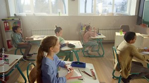 Children learning science in school class. Students having lesson in classroom