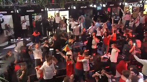 Fans Boxpark Croydon celebrate after Harry Kane's penalty rebound gives England a 2-1 lead in extra time. #ENGDEN #EURO2020 More here: https://bit.ly/3AFDKC0 | ITV News