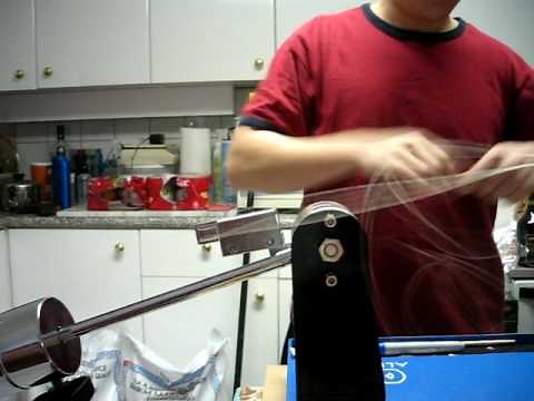 Applying tension on a drop-weight stringing machine w/ clutch