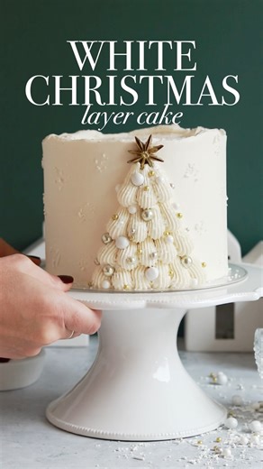 The cutest White Christmas cake with soft, fluffy vanilla cake layers + a piped tree #cake