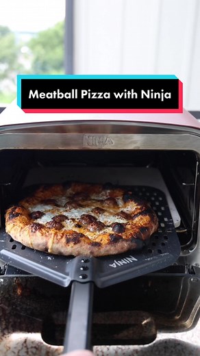 Meatball pizza in my new @NinjaKitchen Woodfire Outdoor Oven! Huge fan - it's an electric outdoor oven that has 8 different functions and can get up to 700 degrees! It perfectly cooked the pizza in just 3 minutes with no turning, and the ability to smoke, bake, and roast makes it the perfect tool for making pizza from scratch #SponsoredByNinja #NinjaOutdoorOven #NinjaWoodfire #Pizza