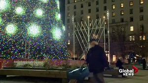 A large menorah and Christmas tree have been lit at the Vancouver Art Gallery to celebrate the holidays. | Global BC
