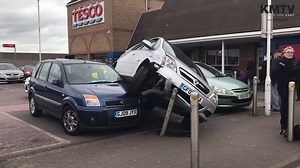VIDEO: This car's certainly got itself in an awkward position in a Tesco carpark http://www.kentonline.co.uk/sheerness/news/car-park-crash-drama-121010/ | KMTV