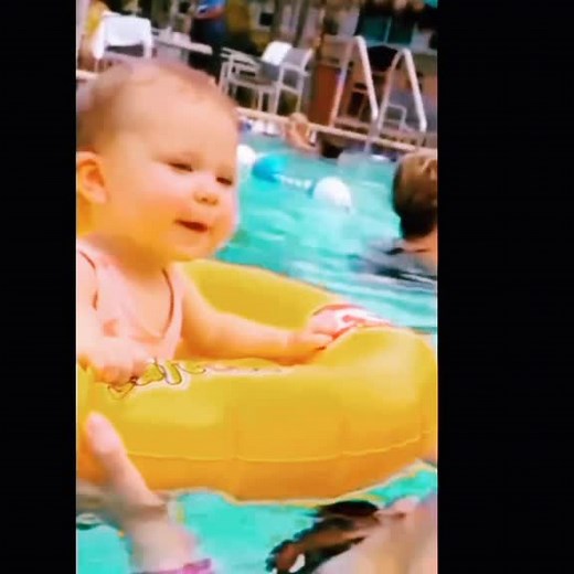 Adorable Little Girl Dancing by the Pool