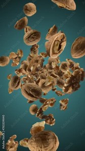 Raw walnuts chunks exploding and flying in super slow motion. Pieces of walnuts drops after explosion. High speed 1000fps vertical video