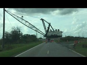 Amazing massive dragline walking across the road
