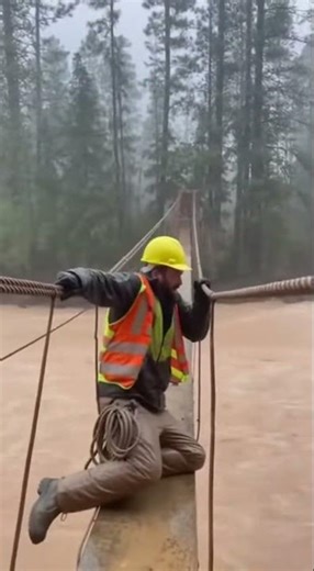 Scaffold Partially Collapses as Workers Hold On!