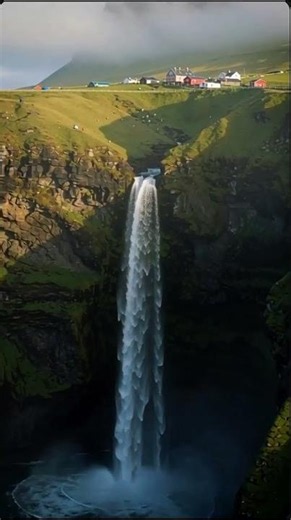 This Village Has a Waterfall Into the Ocean