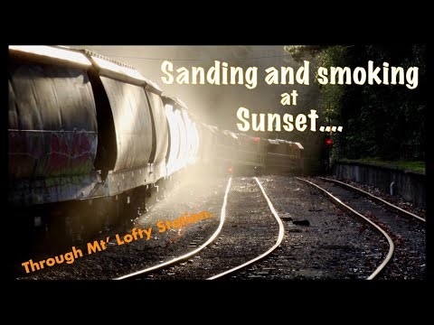 Loaded Aurizon grain train climbs the grade to M't Lotfy Station.