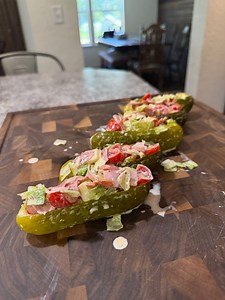 3.5M views · 53K reactions | Pickle boats make the perfect snack for today!! I loaded ours with a chopped Italian filling 襤 #asmr #picklewich #pickleboat #picklesandwich #viralrecipe #4thofjuly #partyfood #snackideas #lunchideas #glutenfree #celiac | I Am Erin Eller | Facebook