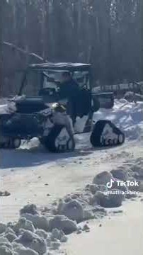 Polaris Ranger plowing with Mattracks LiteFoot series