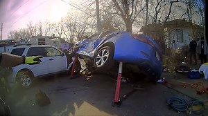 BODYCAM: Officers use 'jaws of life' to rescue crash victims in Kalamazoo