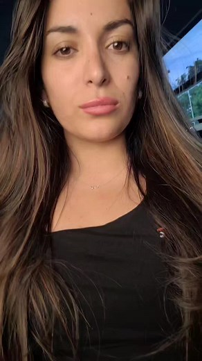 Showcasing Long Brown Hair Inside a Car