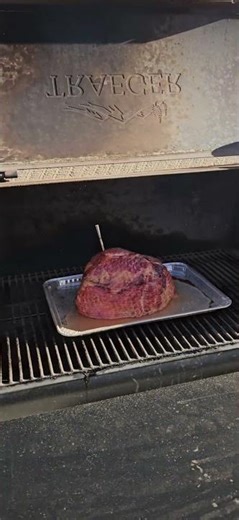 a guy smoking the Thanksgiving ham