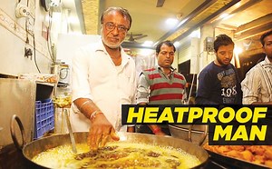 1.4M views · 9.6K shares | This man can dip his hands in boiling oil without flinching, watch the video to believe it! #OMGIndia | HISTORY | Facebook