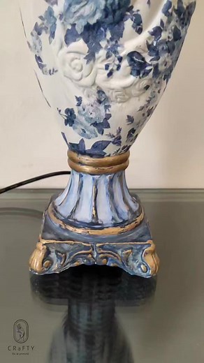 Renewing old table lamp 💙 I used water colors you can also use chalk or acrylic paint... Second step: use mod podge to stick the napkin .. #amirascraft #homedecor #craft #craftyamiras #crafty #craftymom #diyhome #diy #diyprojects #diyproject #diyhomedecor #diyideas #beautiful #amazing #spray #vasedesign #vasecraft #painting #painter #decoupageart #RENEW #tablelamp | C R a F T Y