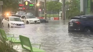 Cars underwater as "Tropical Storm Alex" washes over Florida