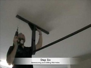 How to Install a Pullup Bar On the Ceiling