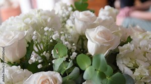 wedding bouquet of roses Bouquet of white roses A bouquet of white flowers for the wedding day, a floral centerpiece of white roses