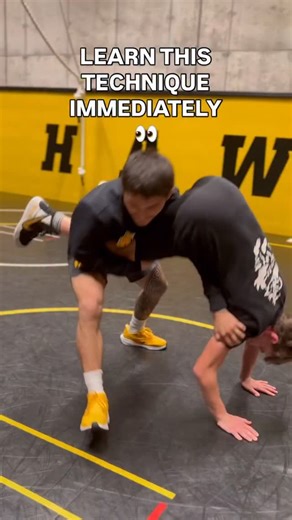 Miami Hawks Wrestling on Instagram: "FREESTYLE TURN THAT SCORES FAST FROM BEHIND 😤 This turn works because you control the leg and the upper body at the same time no space, no scramble. My opponent is down, and I’m behind him in control. My right hand goes to his right leg above the knee, and I lift it off the ground to take away his base. At the same time, my left hand slides underneath his body to his right shoulder. From there, I drive him forward, keep my pressure tight, and flip him straig