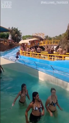Man runs down water slide #waterslide #shorts #funny