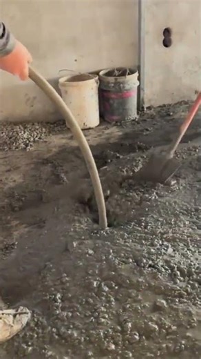 clean up the scattered cement with the help of a pipe and suction hose