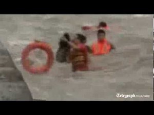 Typhoon Haiyan: video captures dramatic rescue from huge waves