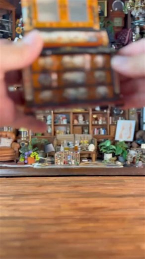 STUNNING masterpiece in miniature by Renee Isabelle in 1/12 scale is part of my latest estate auction happening now in my eBay store (link in bio to bid now, auction ends Sunday during the 7 PM ET hour. Standing at almost 9 inches tall, this hand painted wood cabinet has several drawers and upper doors with a bowfront curved center drawer with the detailed Seascape likely depicting 17 century Europe, perhaps Spain. Seems like this are painted on panels throughout the cabinet with painstaking det