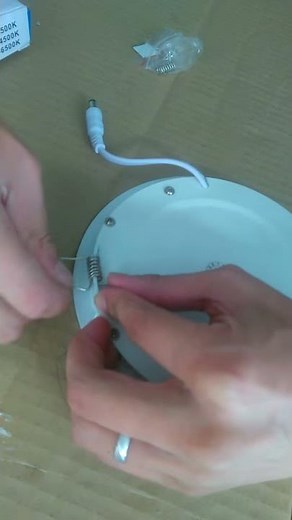 install the panel light spring clip