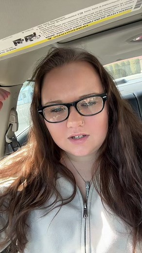 Adjusting Hair and Sunglasses Inside a Car