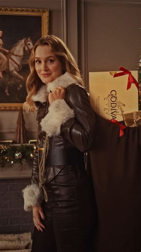 Holidays are best decked in gold… GODIVA Gold. @itsmeleighton brings the magic with a surprise entrance worthy of Santa himself, and GODIVA brings the indulgence. Discover the NEW Gold Collection: crafted for chocolate lovers with decadent hazelnut praliné, silky caramel, and ruby cacao. Celebrate the season in Lady Godiva-style. Available at @macys, @bloomingdales, & GODIVA.com. | GODIVA