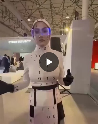 Iran Expo's 'Humanoid Robots' Revealed as Costumed Performers at a cybersecurity booth at the late November expo on Kish Island, which spotlights investment, fintech, and economic partnerships amid… | Dave Schroeder | 13 comments