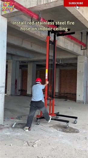 Install red stainless steel fire hose on indoor ceiling