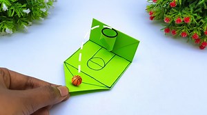 298K views · 2.5K reactions | DIY how to make basketball slam dunk - Moving paper toy ideas - Funny origami mini toy basketball pop it #Crafts #DIYToy #Origami | Entertaining Arts | Facebook