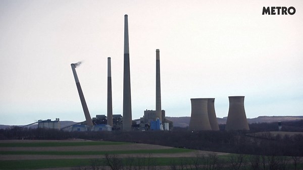 Coal power station chimneys knocked down in controlled demolition