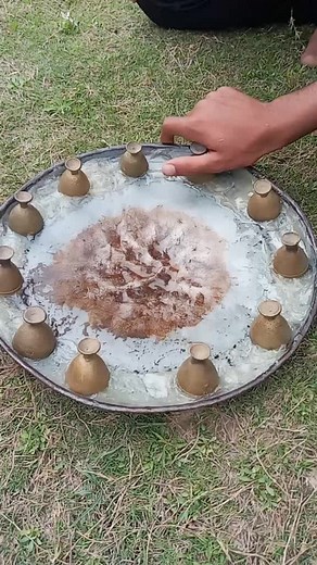 Experiments with Brass Objects on a Reflective Tray