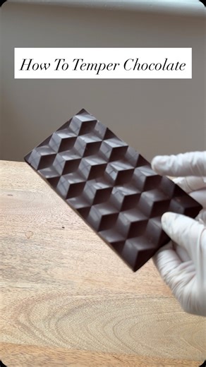Elspeth | Chocolatier on Instagram: "Tempering chocolate- part 3 of experiments with chocolate Ever gotten stuck on how to temper chocolate? It’s not bad chocolate it’s bad tempering…. Here’s how to fix it. Chocolate contains cocoa butter, which can crystallise in several forms. Only Form V provides shine, snap, and stability. Without proper temperature control, unstable crystals form first, leading to fat bloom as they reorganise and push fat to the surface. Tempering ensures stable crystals fo