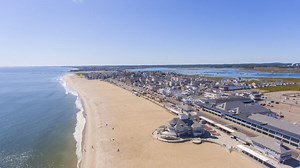 A Small Plane Towing a Banner Lands in the Ocean Off a Crowded New Hampshire Beach; Pilot Unhurt