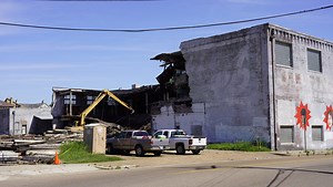 Old Downtown warehouse razed for new condos