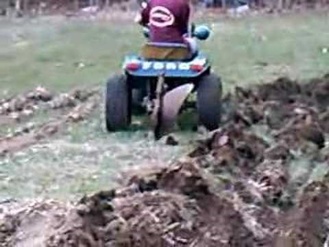 1974 Ford LGT Plowing The Garden